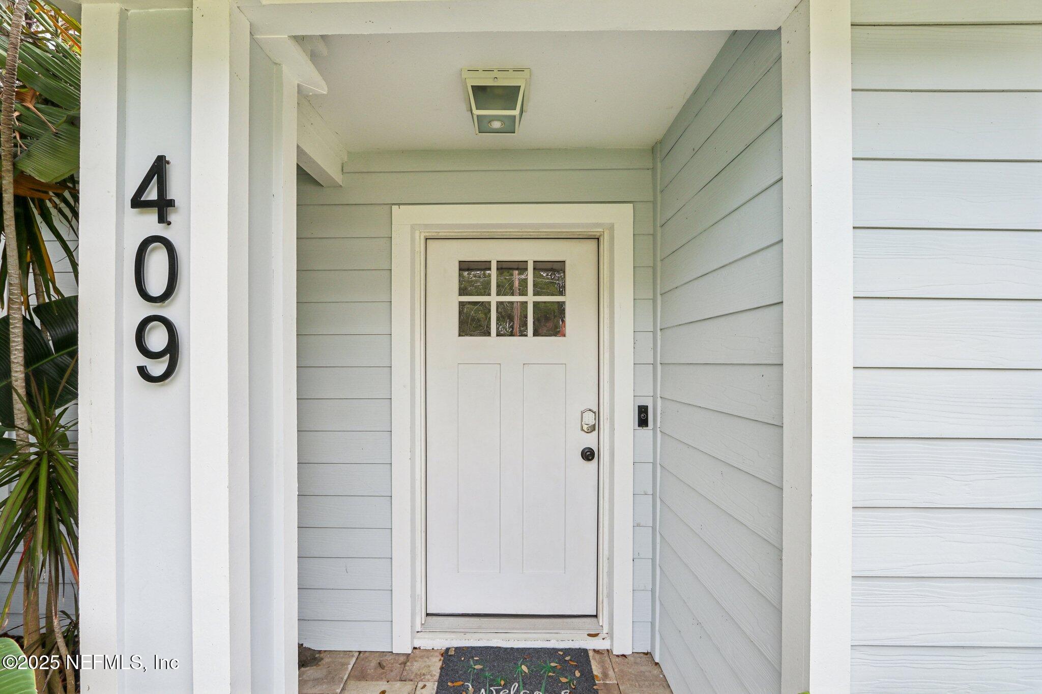 409 Seventeenth Street St. Augustine, FL 32084 - Photo 5 of 42 a view of front door of house