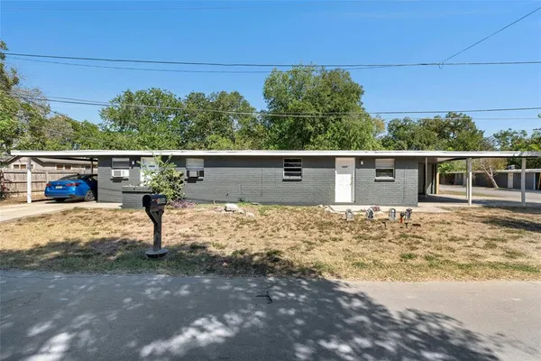 front view of house with a yard