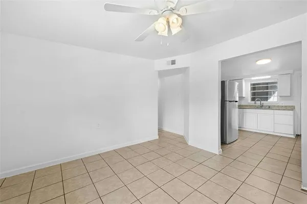 a view of a kitchen with a sink