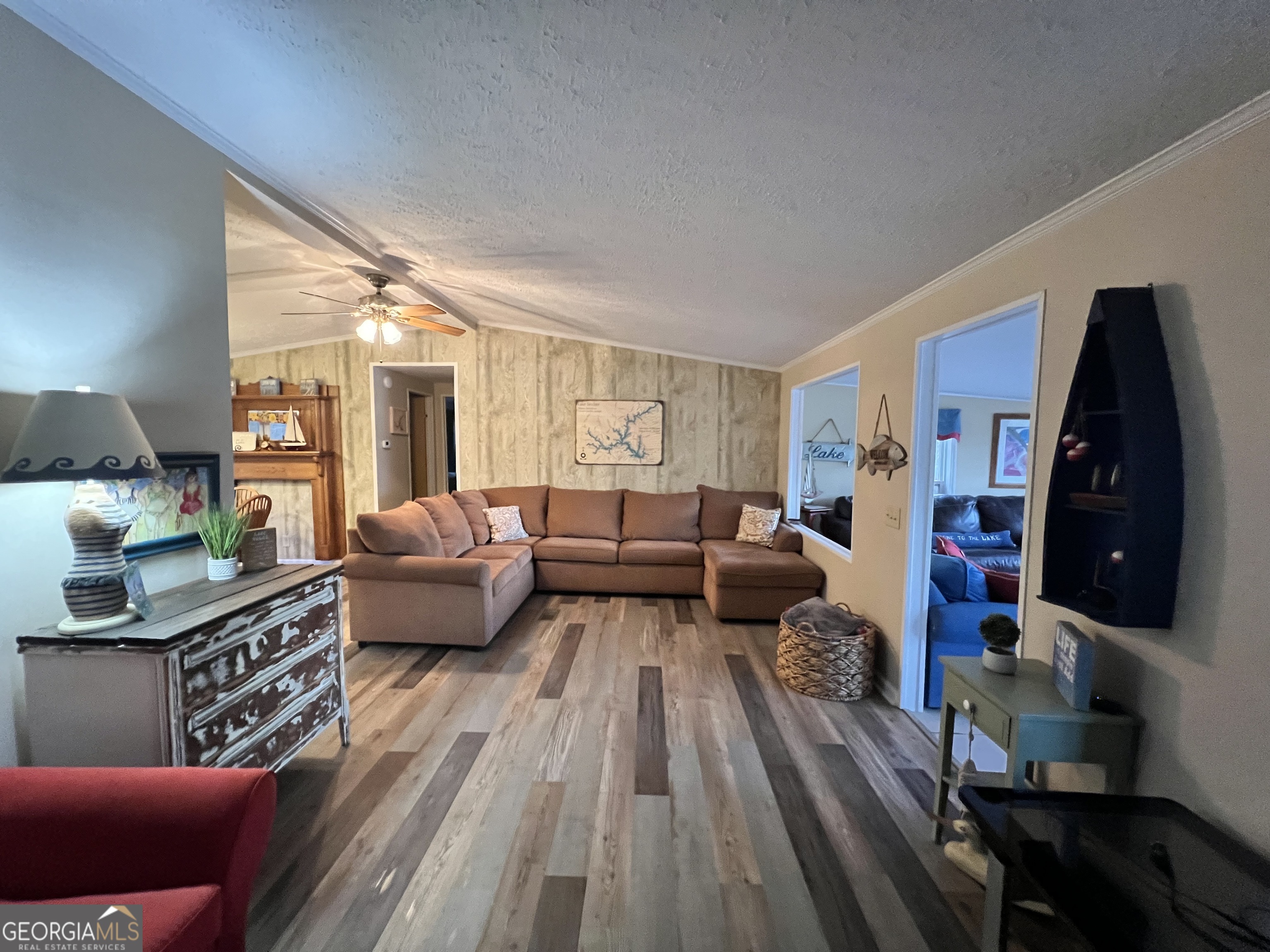 64 Bay Point Sparta, GA 31087 - Photo 22 of 53 a living room with furniture and wooden floor