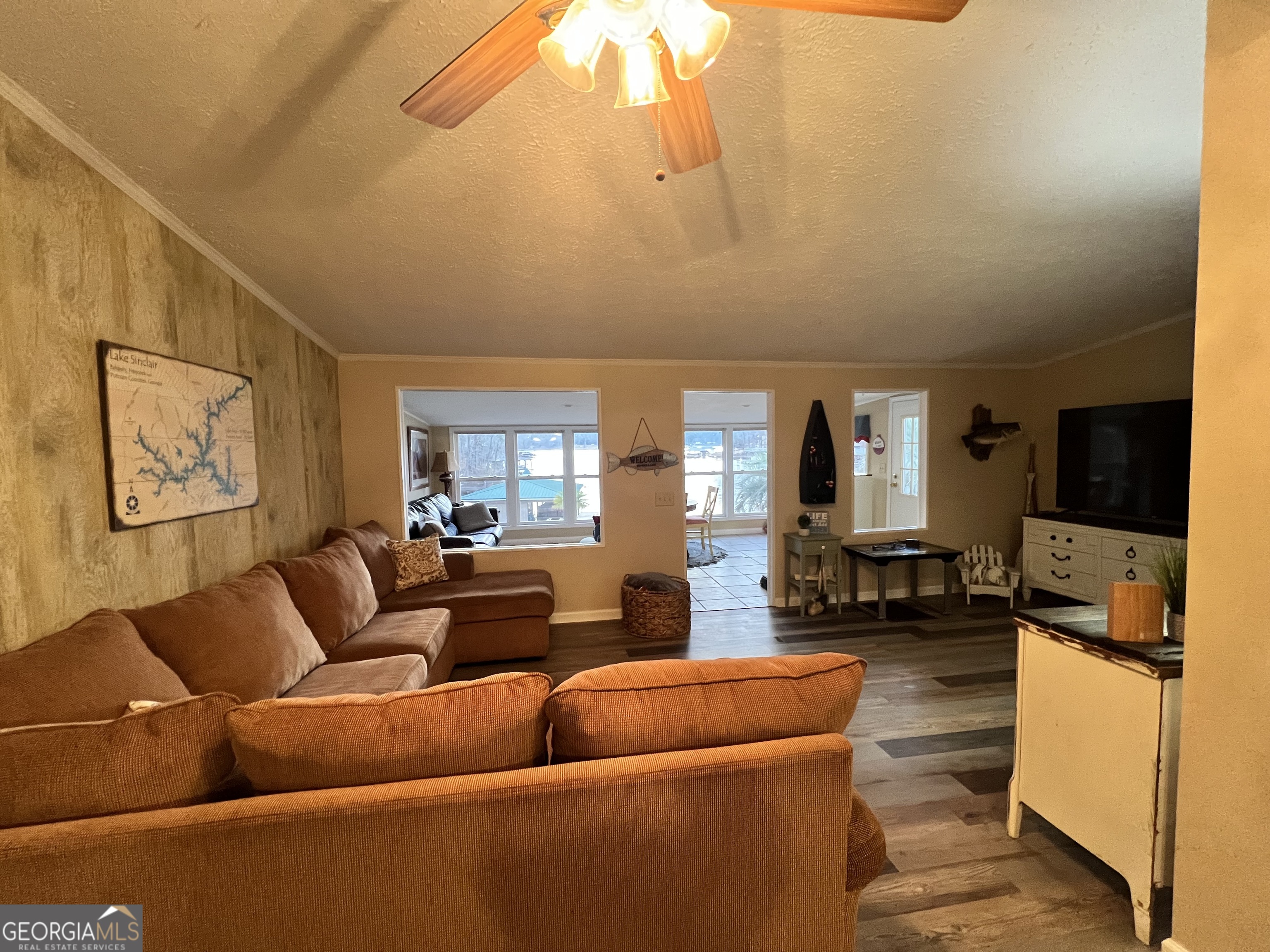 64 Bay Point Sparta, GA 31087 - Photo 29 of 53 a living room with furniture and a flat screen tv