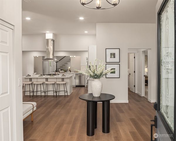 a living room with furniture and a table