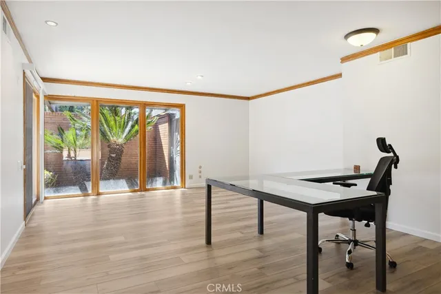 a view of a livingroom with furniture and window
