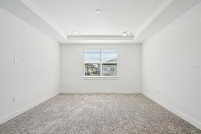 a bathroom with a shower and a sink