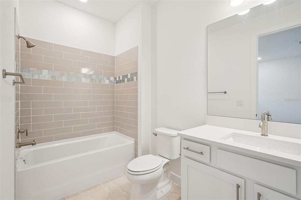 5236 Southwest 88th Circle Ocala, FL 34481 - Photo 17 of 29 a bathroom with a sink toilet and bathtub