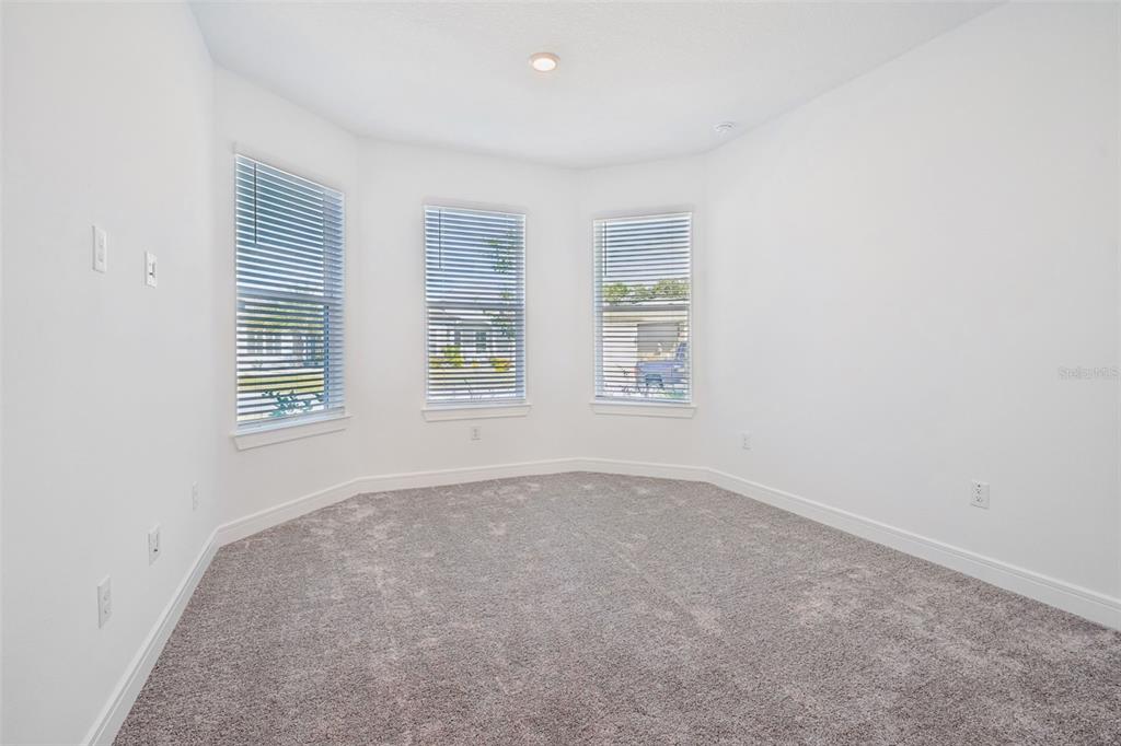 5236 Southwest 88th Circle Ocala, FL 34481 - Photo 22 of 29 an empty room with windows