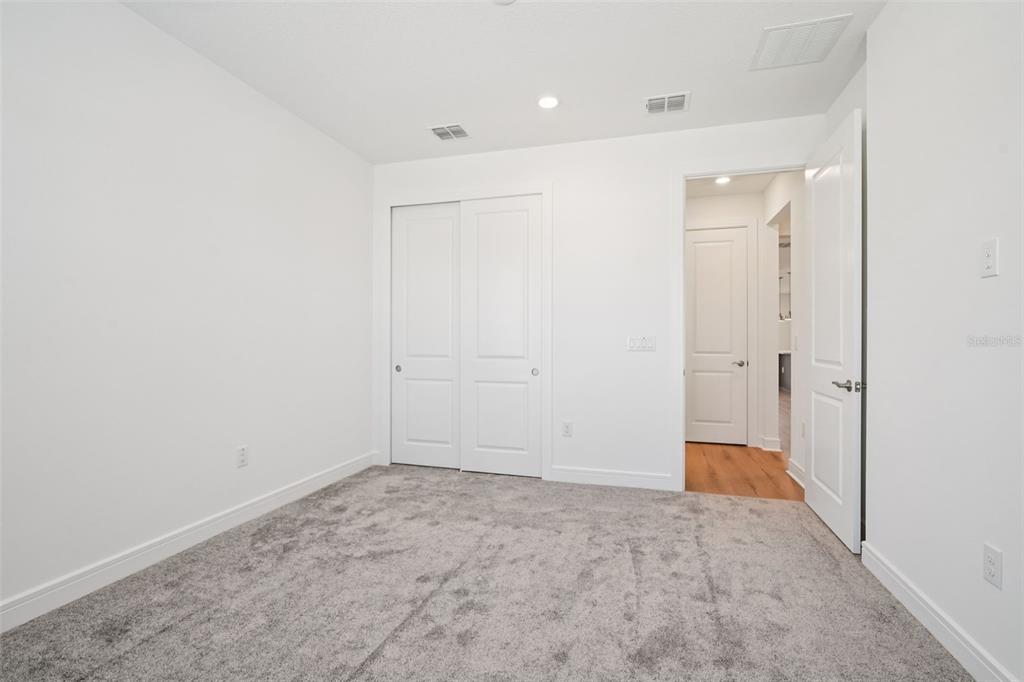 5236 Southwest 88th Circle Ocala, FL 34481 - Photo 23 of 29 an empty room with a bathroom