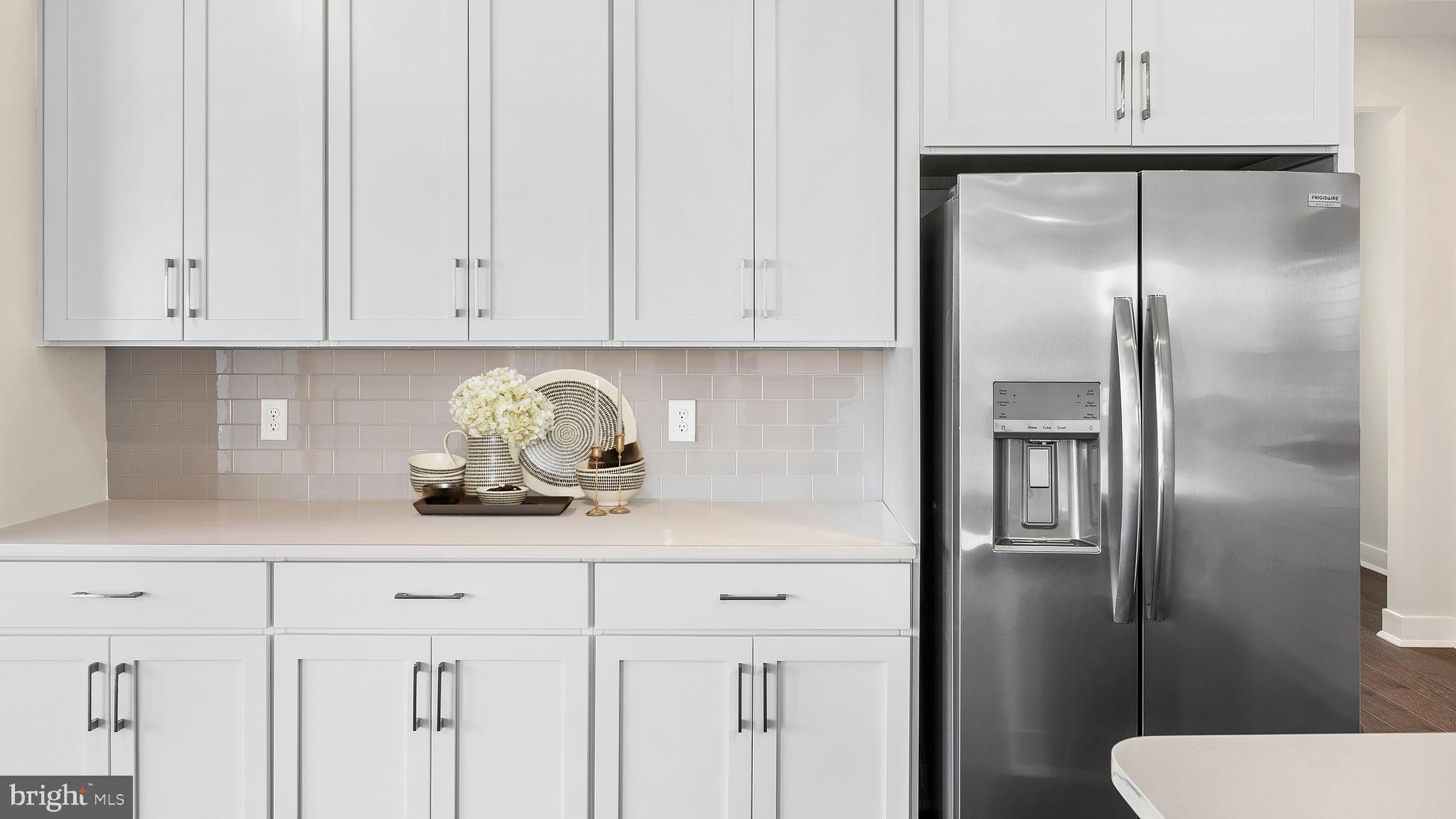 1153 Mariwill Drive Quakertown, PA 18951 - Photo 12 of 14 a kitchen with stainless steel appliances white cabinets and a refrigerator
