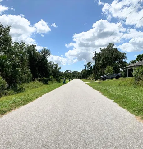 a view of a house with a big yard