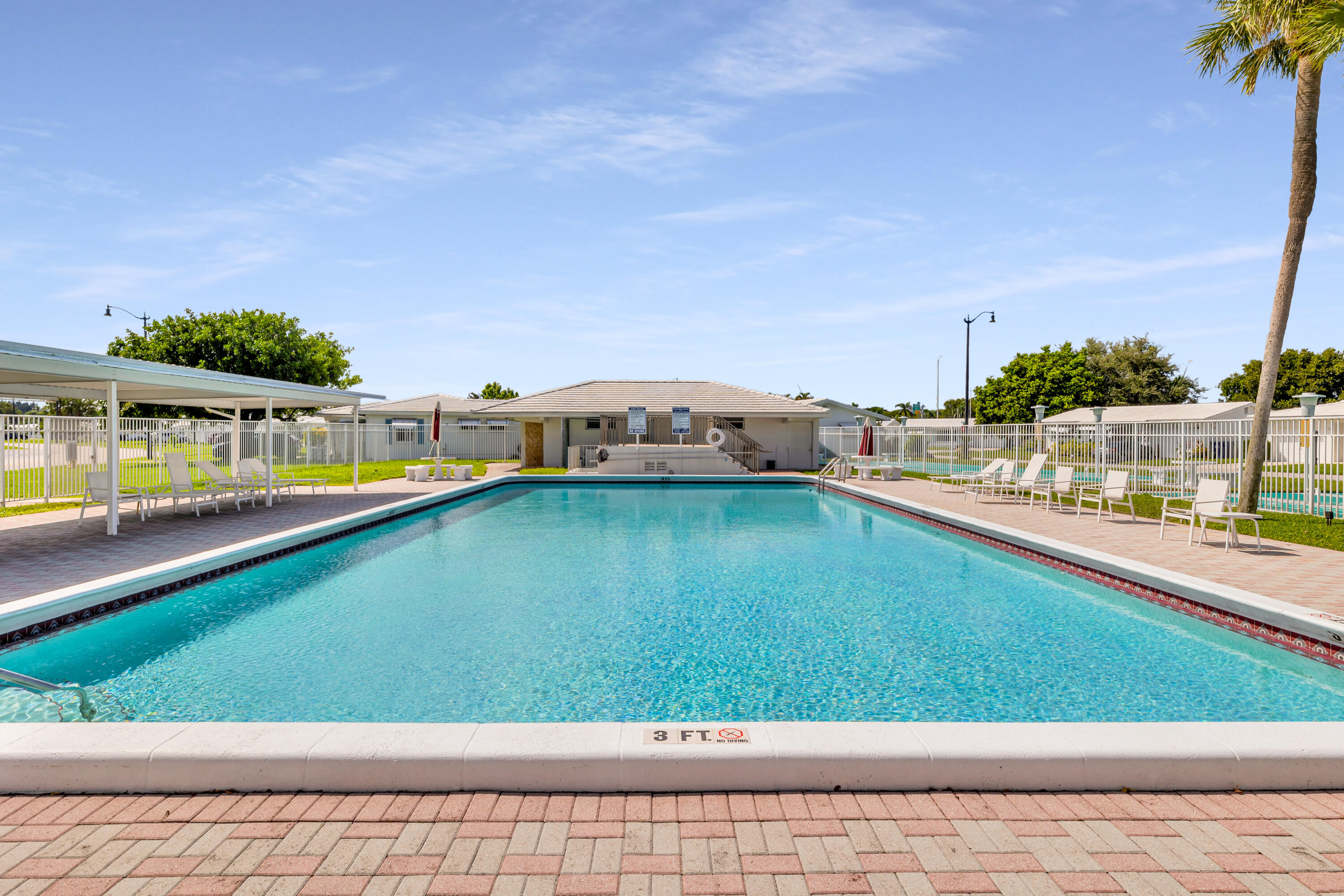 251 South Golf Boulevard, Unit 287 Pompano Beach, FL 33064 - Photo 39 of 63 a view of a swimming pool