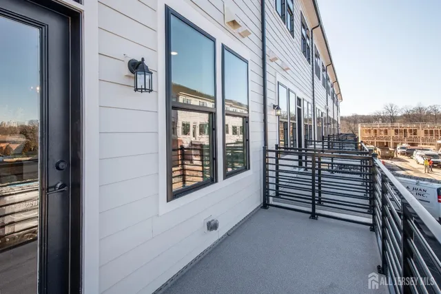 a view of a balcony and an entryway