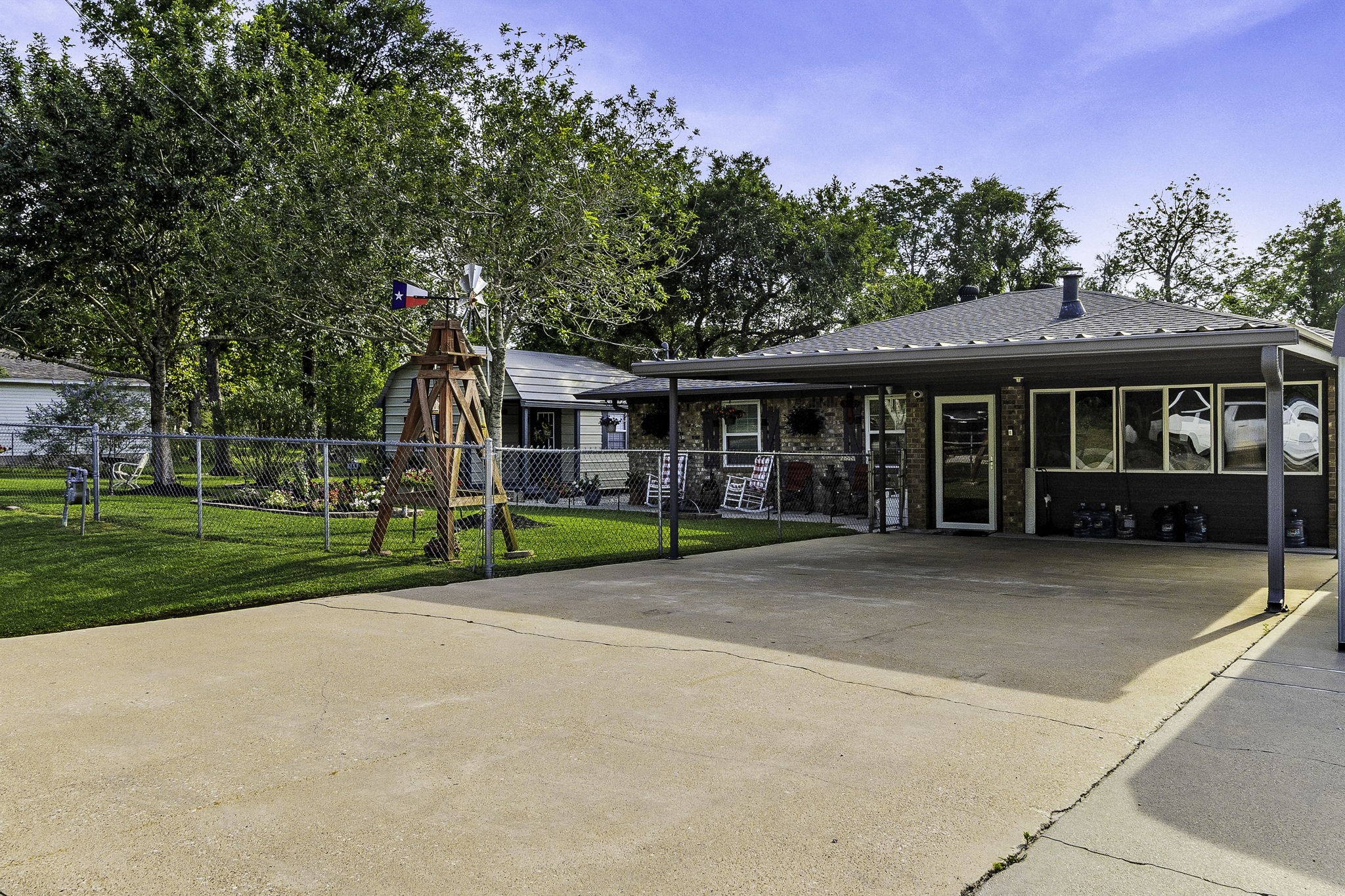 188 Huckleberry Road Onalaska, TX 77360 - Photo 3 of 49 front view of a house with a yard