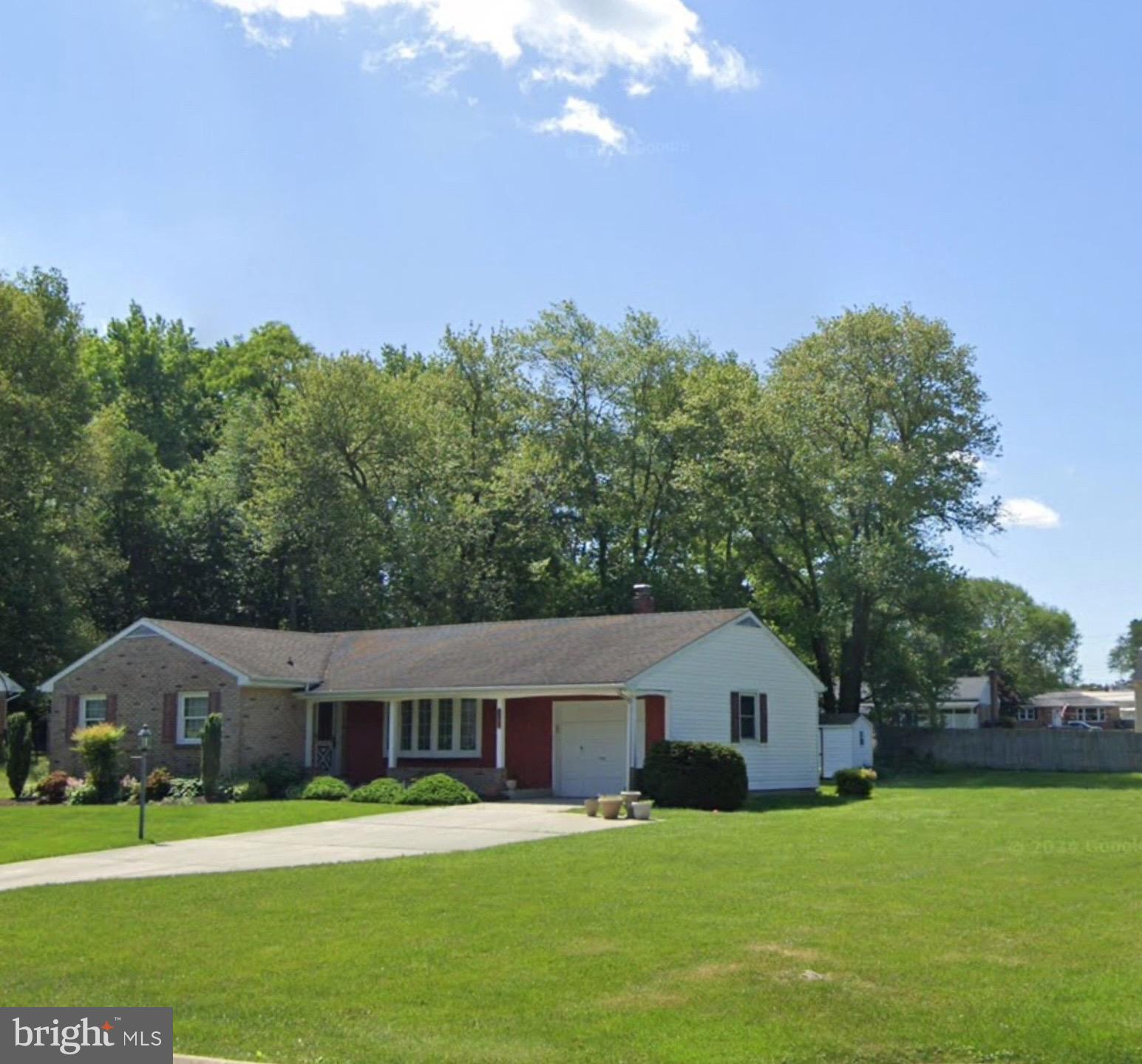 Cute home on large corner lot. Mature greenery.