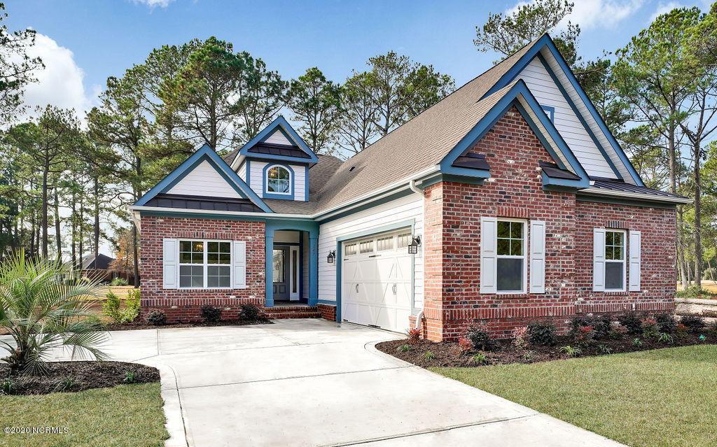 147 Clubhouse Road Sunset Beach, NC 28468 - Photo 1 of 33 147ClubhouseRoad-01
