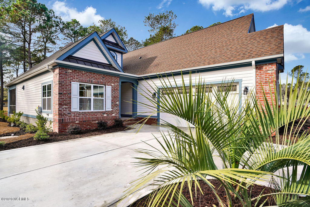 147 Clubhouse Road Sunset Beach, NC 28468 - Photo 4 of 33 147ClubhouseRoad-02