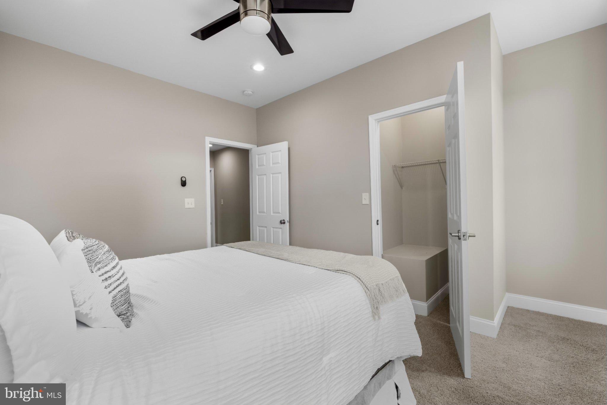 145 North Monastery Avenue Baltimore, MD 21229 - Photo 15 of 45 Serene bedroom with modern accents.