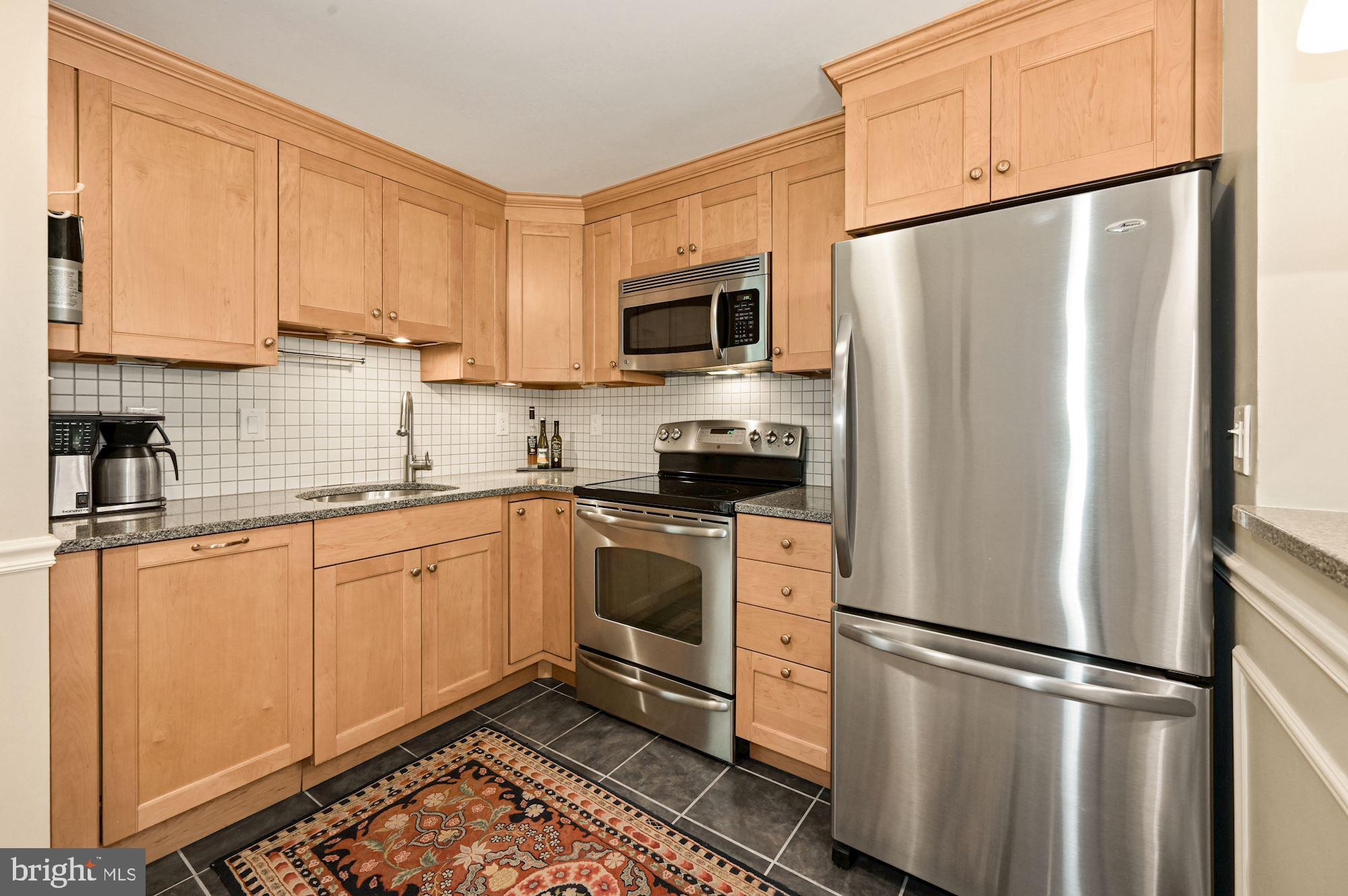 1823 Corcoran Street Northwest, Unit 9 Washington, DC 20009 - Photo 12 of 34 Updated Kitchen With Stainless Steel Appliances