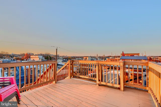 a balcony with outdoor seating