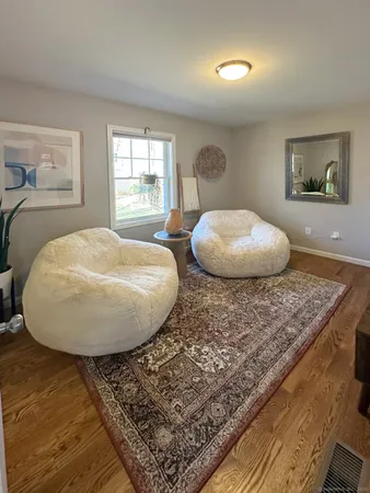 a room with a table and chairs