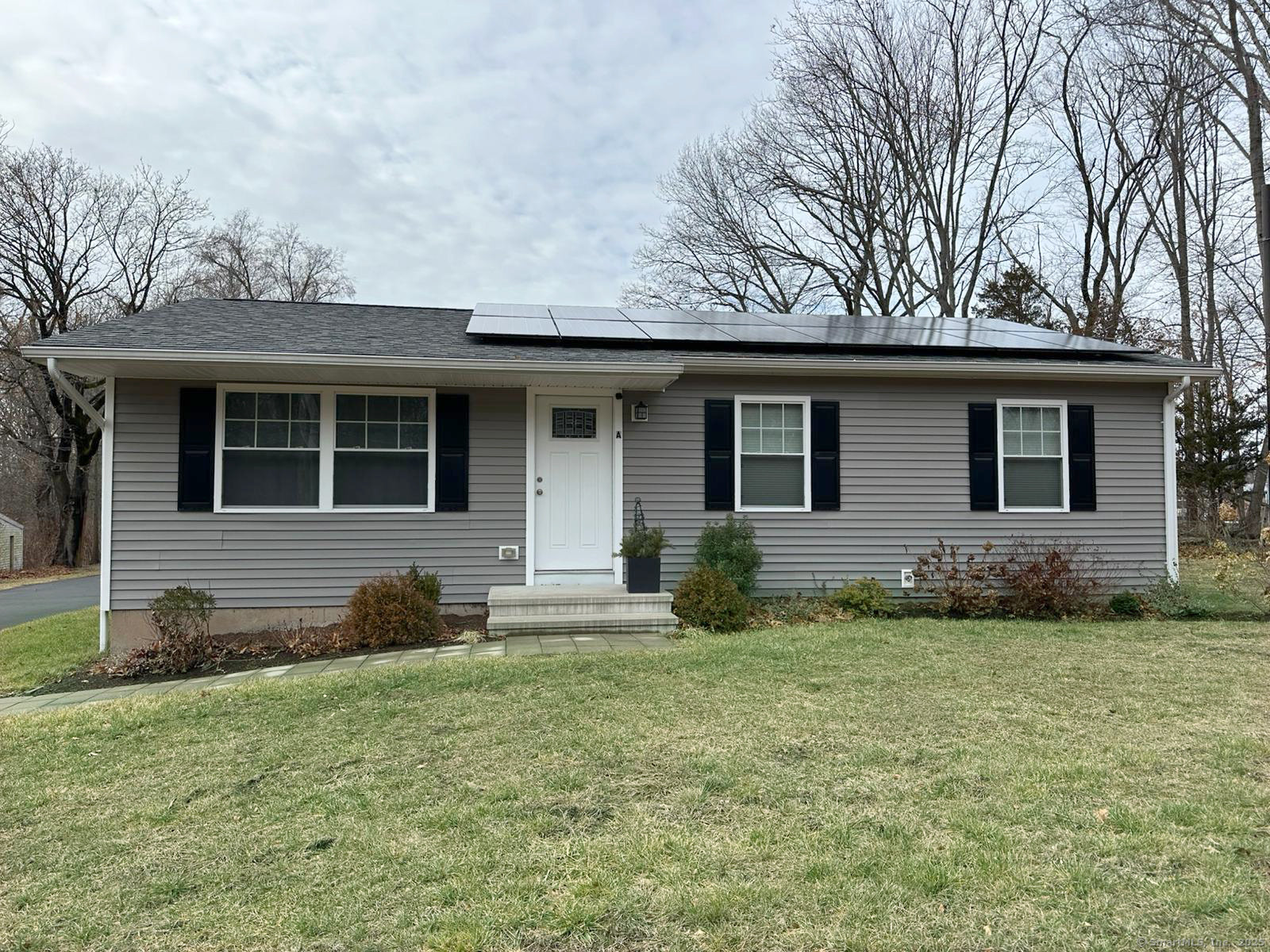 55 Overbrook Road North Haven, CT 06473 - Photo 2 of 21 a front view of a house with a yard