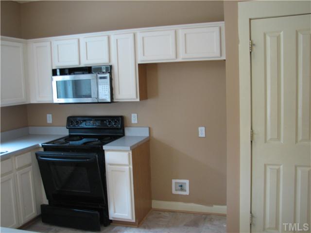 2153 Dunn Road Raleigh, NC 27614 - Photo 5 of 7 Spacious kitchen- all applicances included excpet refrigerator.