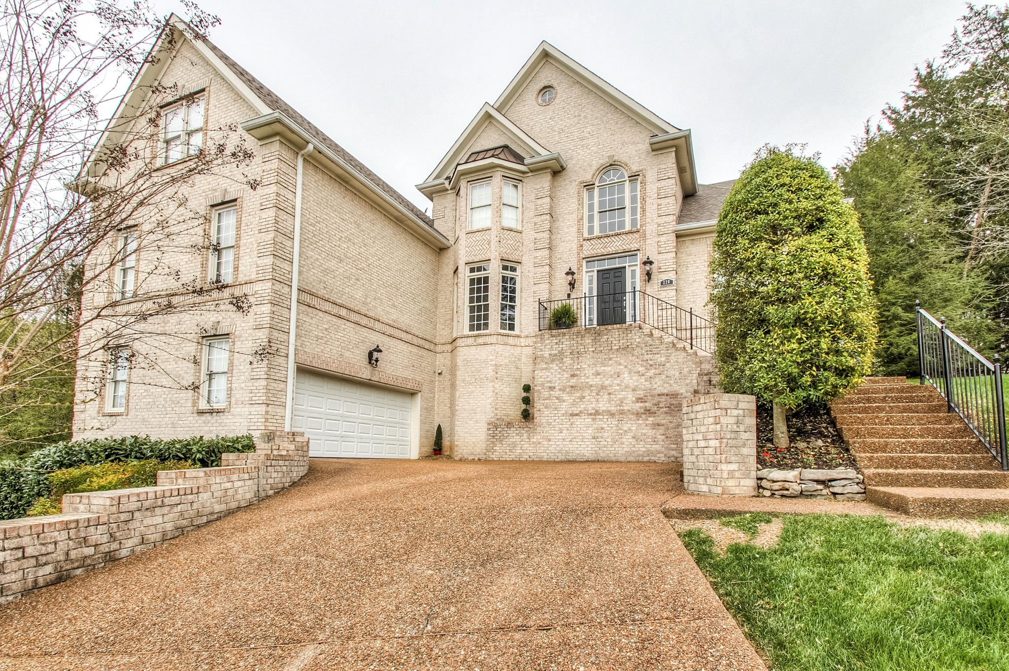 228 Halberton Drive Franklin, TN 37069 - Photo 20 of 23 front view of a house with a yard