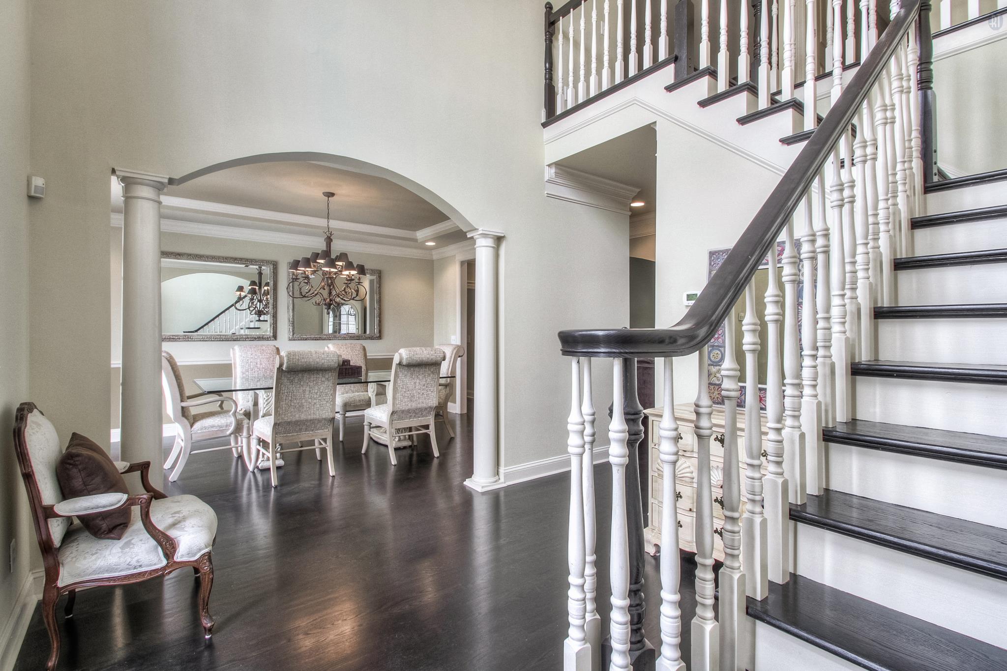 228 Halberton Drive Franklin, TN 37069 - Photo 2 of 23 a view of entryway and dining room with wooden floor