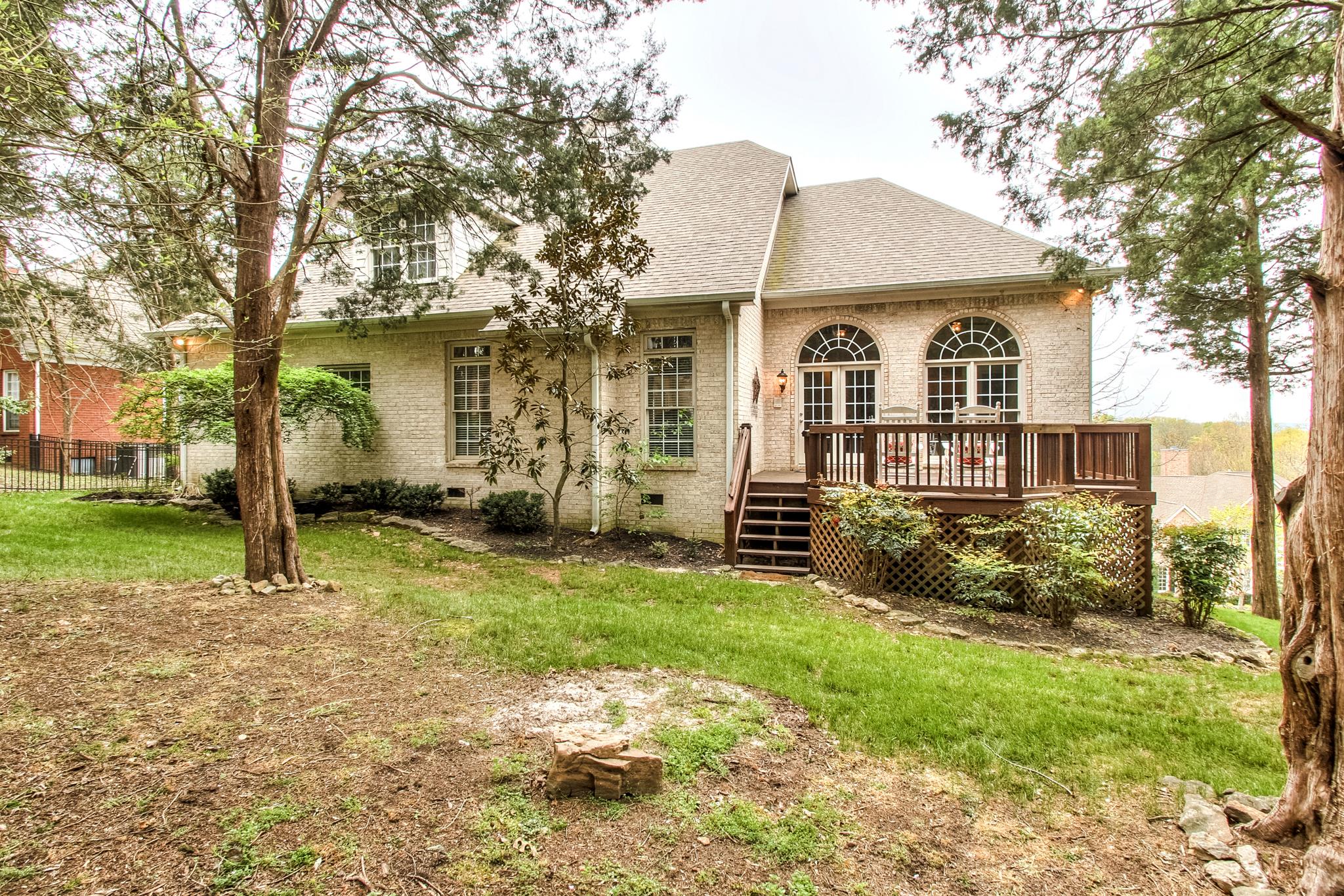 228 Halberton Drive Franklin, TN 37069 - Photo 22 of 23 a front view of a house with garden
