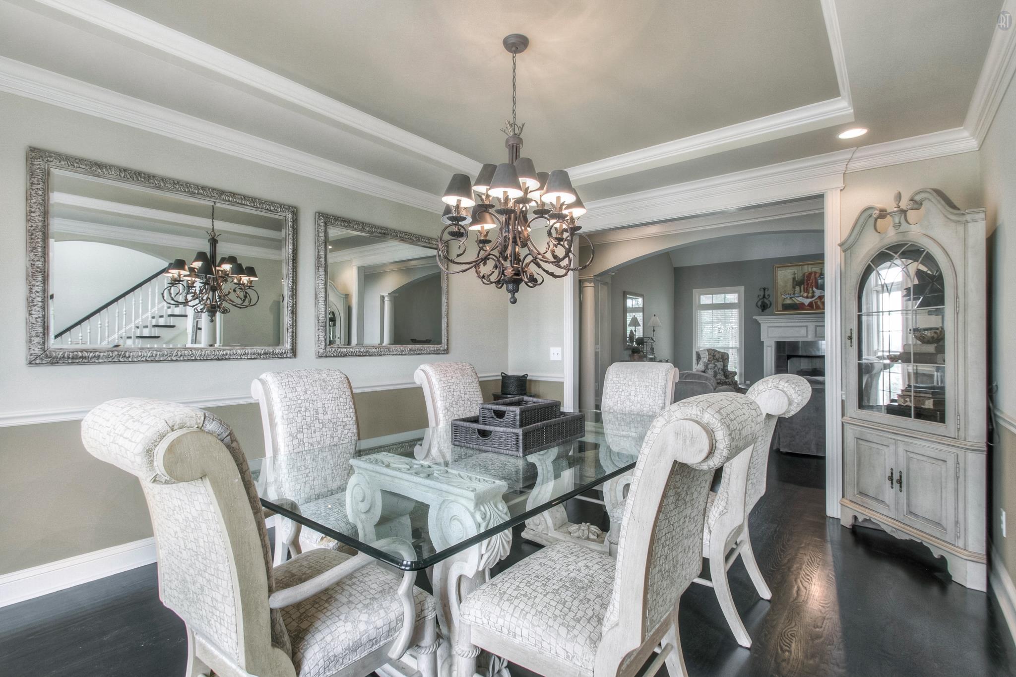 228 Halberton Drive Franklin, TN 37069 - Photo 3 of 23 a view of a dining room with furniture and chandelier