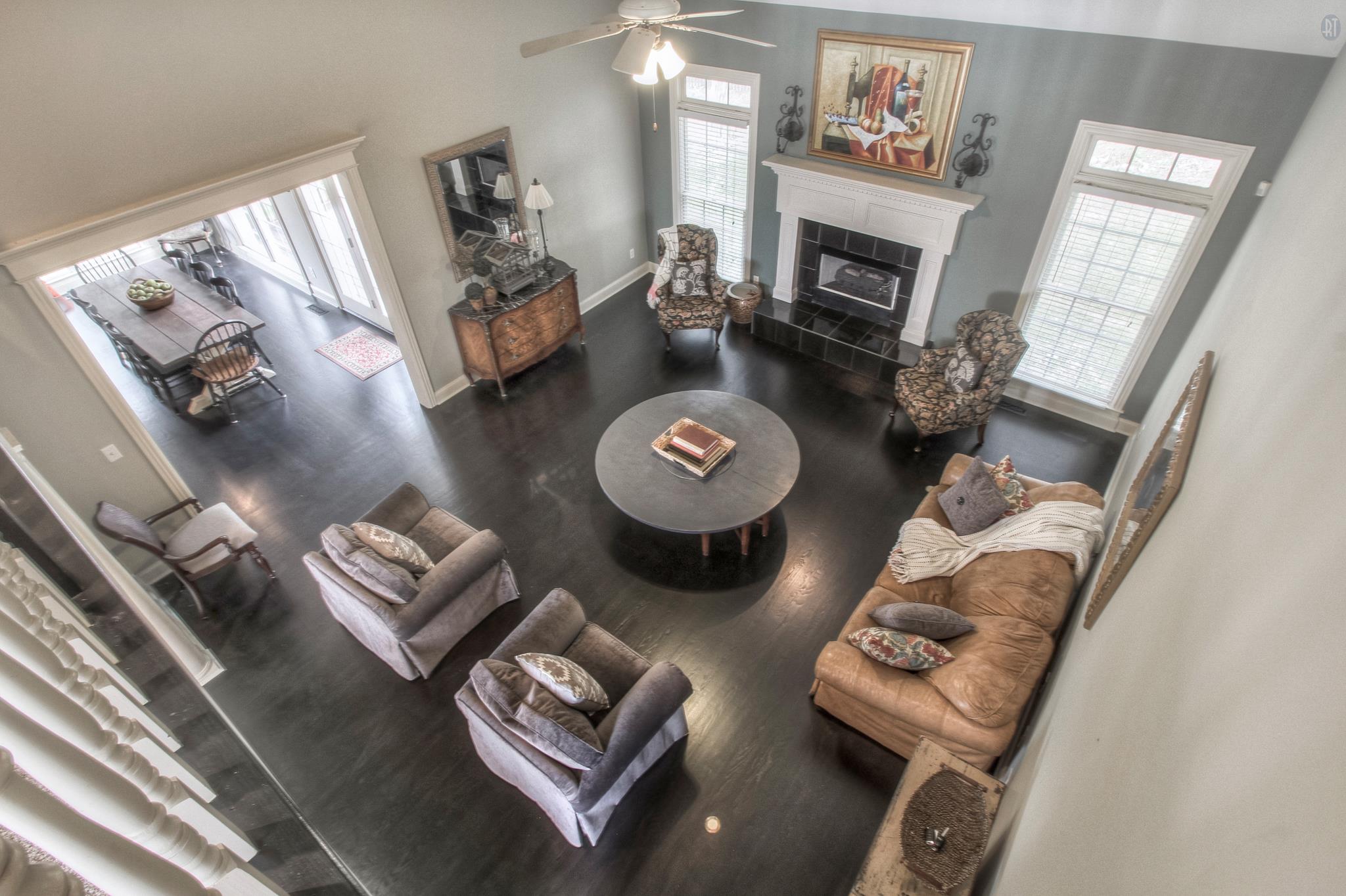 228 Halberton Drive Franklin, TN 37069 - Photo 8 of 23 a living room with furniture and a fireplace