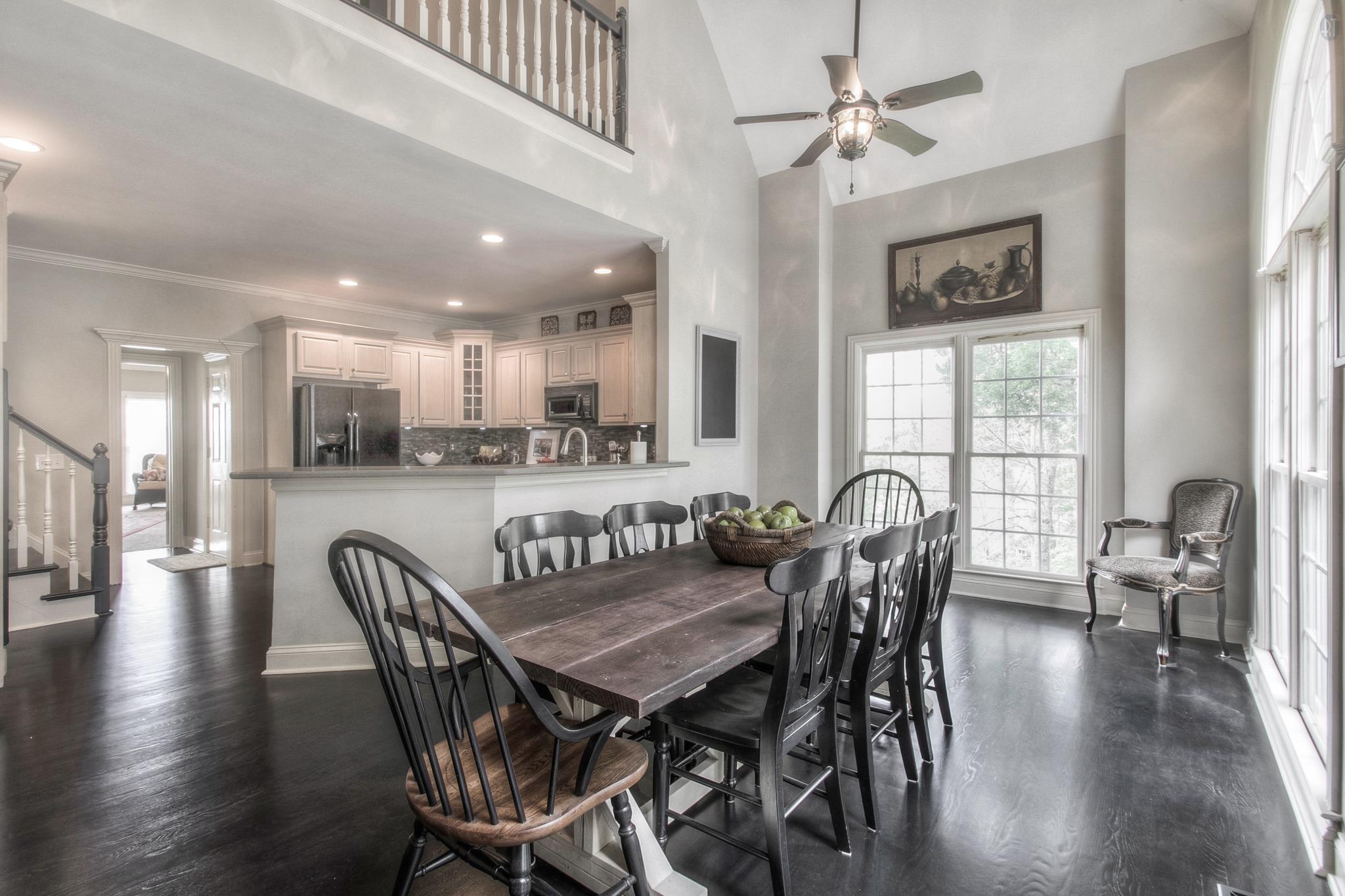 228 Halberton Drive Franklin, TN 37069 - Photo 9 of 23 a dining room with furniture and wooden floor