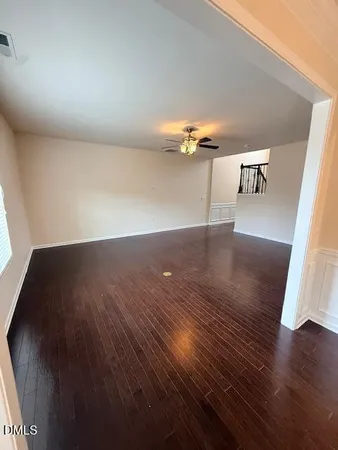 a view of a livingroom with wooden floor
