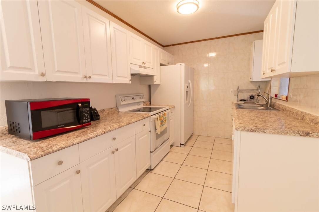 203 Jersey Road West Lehigh Acres, FL 33936 - Photo 7 of 27 Gallery Image 7