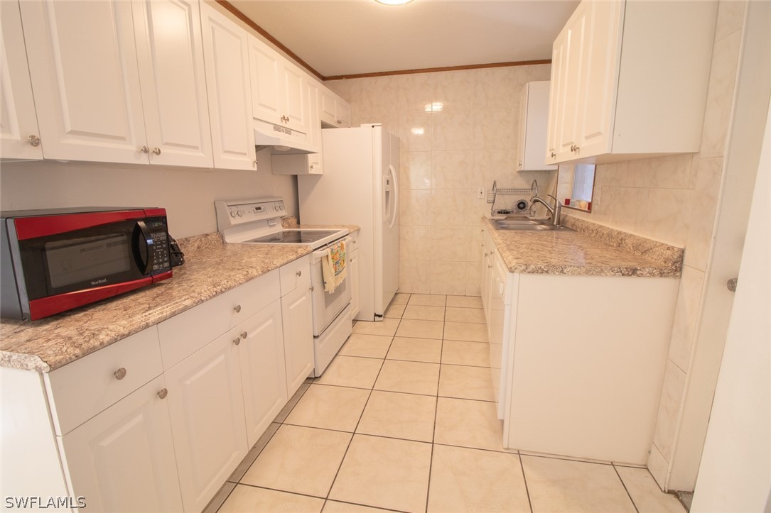 203 Jersey Road West Lehigh Acres, FL 33936 - Photo 8 of 27 Gallery Image 8