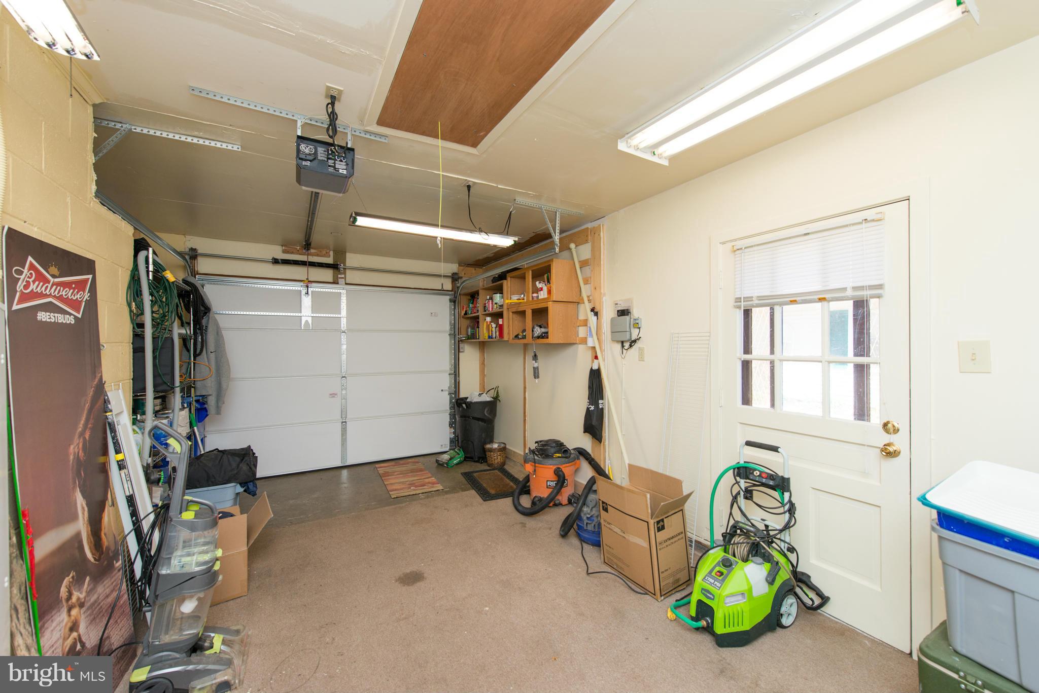 4915 Ridgeview Lane Bowie, MD 20715 - Photo 26 of 30 New Garage Door/ Service Door to Side Yard