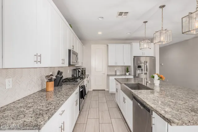 a view of a dining room with furniture and window
