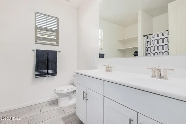 a view of a kitchen with a sink stainless steel appliances and cabinets