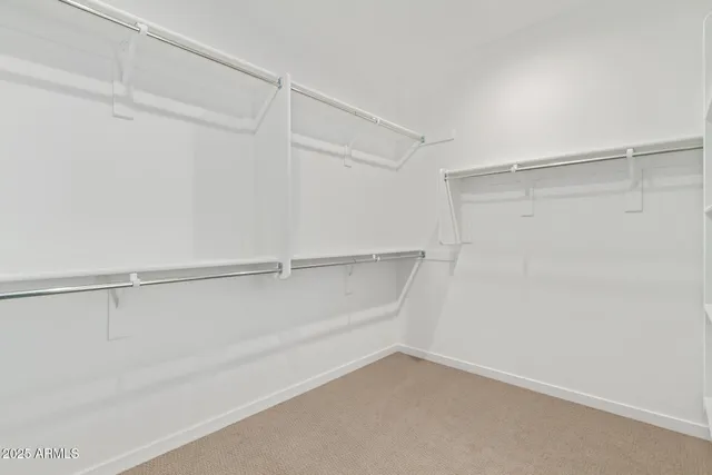 a bathroom with a sink toilet and mirror