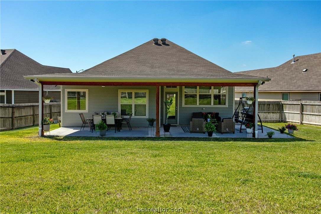 2071 Positano Loop Bryan, TX 77808 - Photo 29 of 31 a view of a house with a yard and sitting area