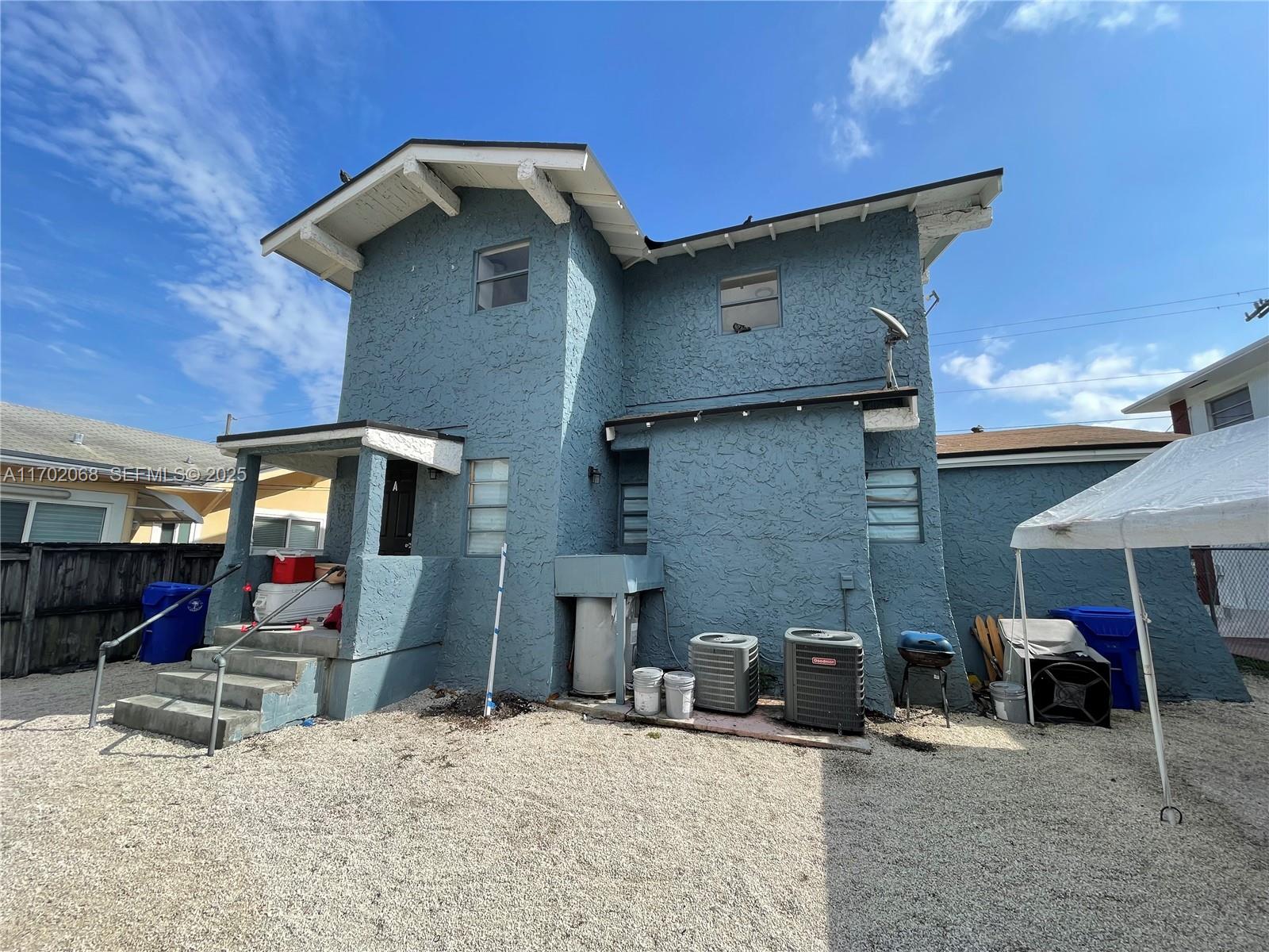 236 Southwest 10th Avenue Miami, FL 33130 - Photo 5 of 15 a view of a house with a patio