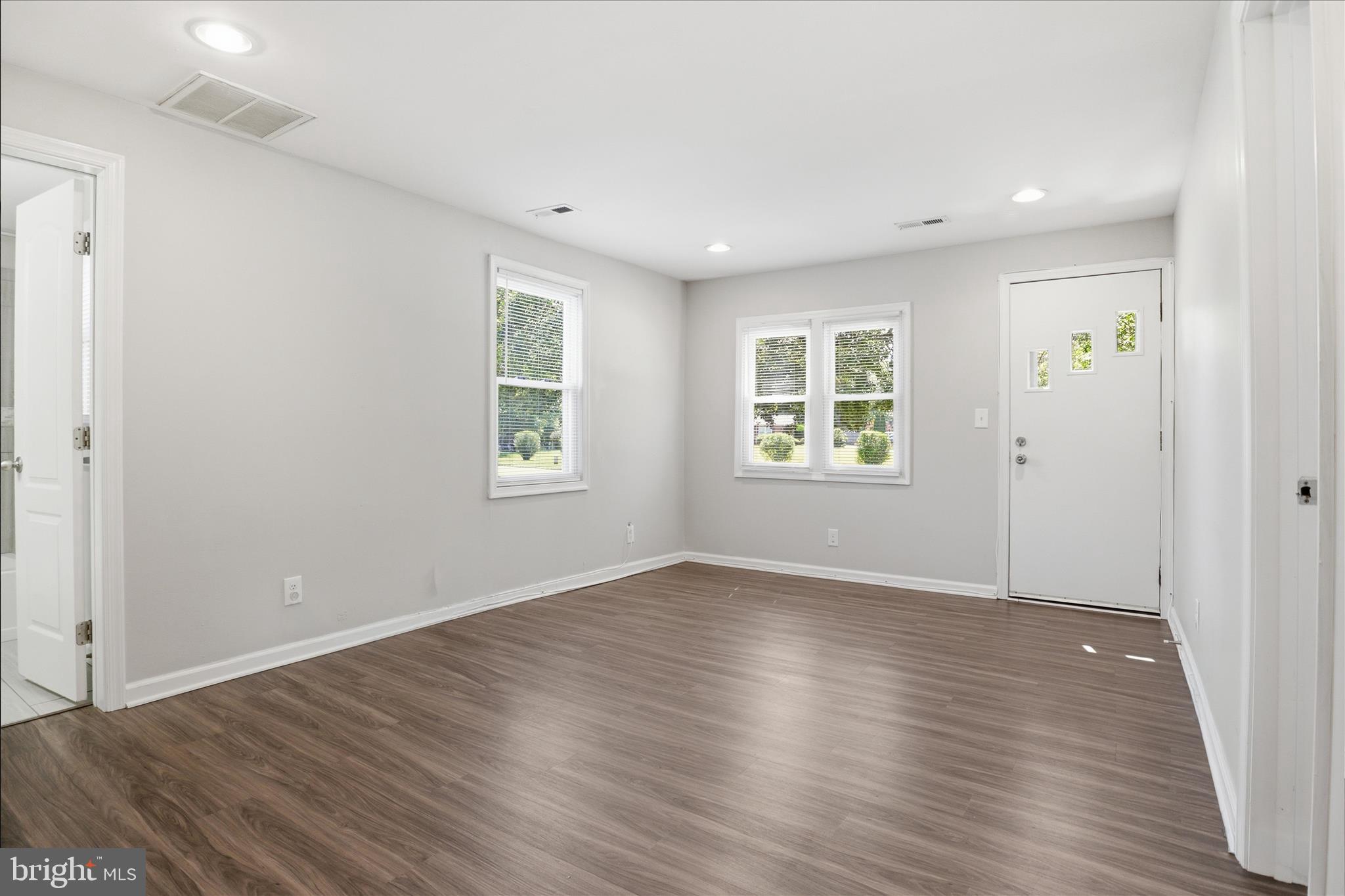 5242 Sands Road Lothian, MD 20711 - Photo 7 of 29 Living Room with LVP flooring