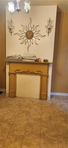 a view of table and chairs in patio