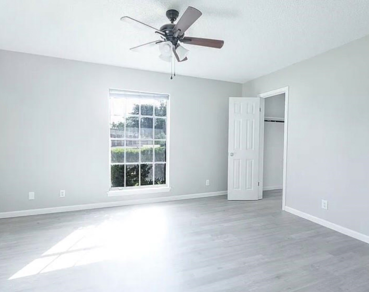 1965 Campbell Road, Unit 1965 Houston, TX 77080 - Photo 11 of 13 a view of an empty room with a window