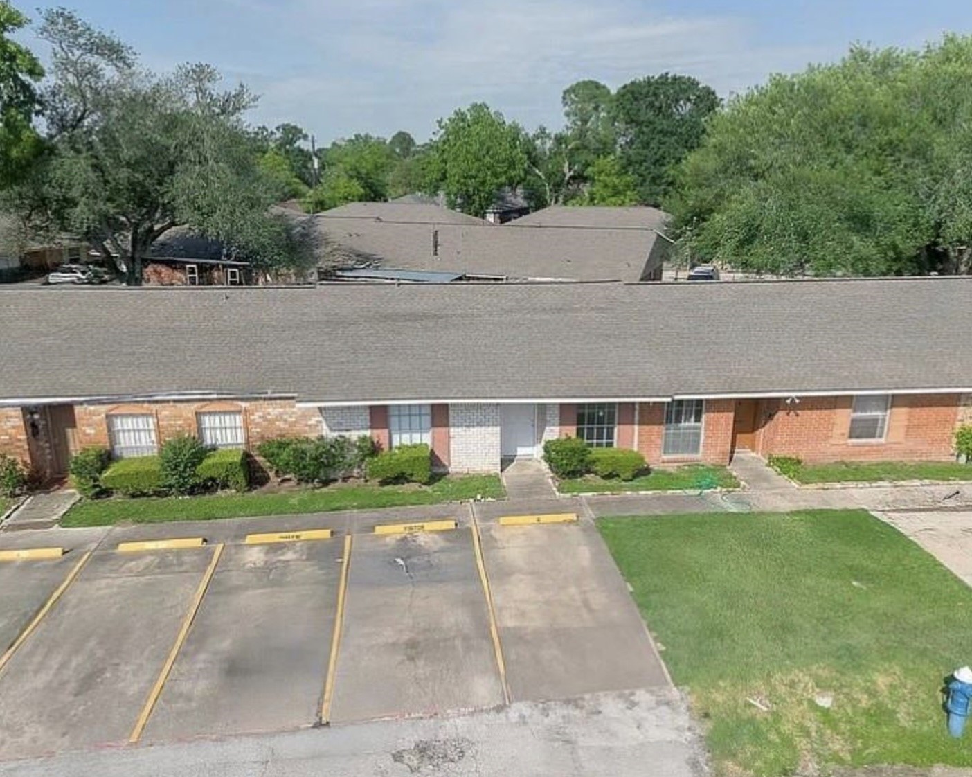 1965 Campbell Road, Unit 1965 Houston, TX 77080 - Photo 2 of 13 front view of house with a yard