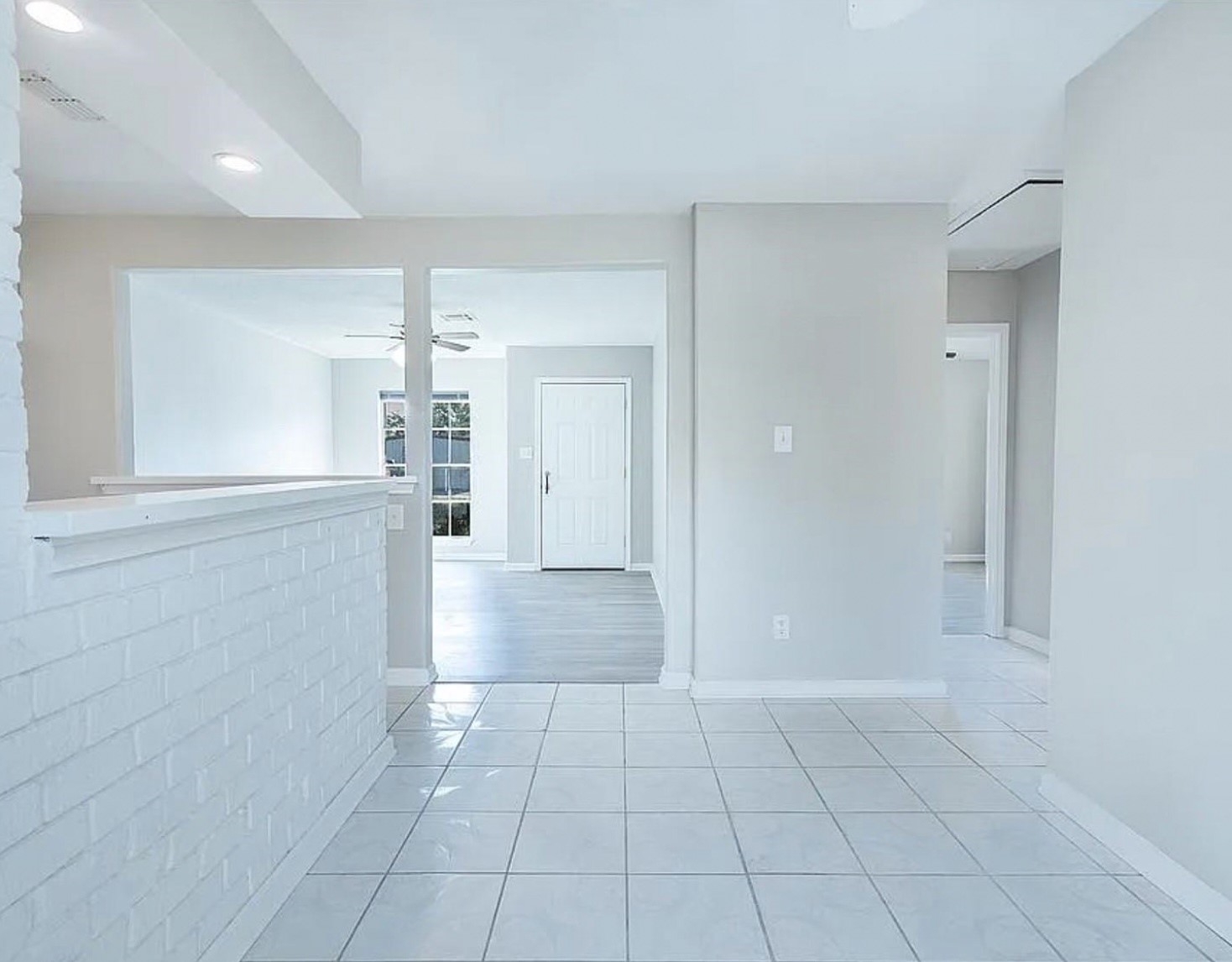 1965 Campbell Road, Unit 1965 Houston, TX 77080 - Photo 3 of 13 a view of an empty room and window