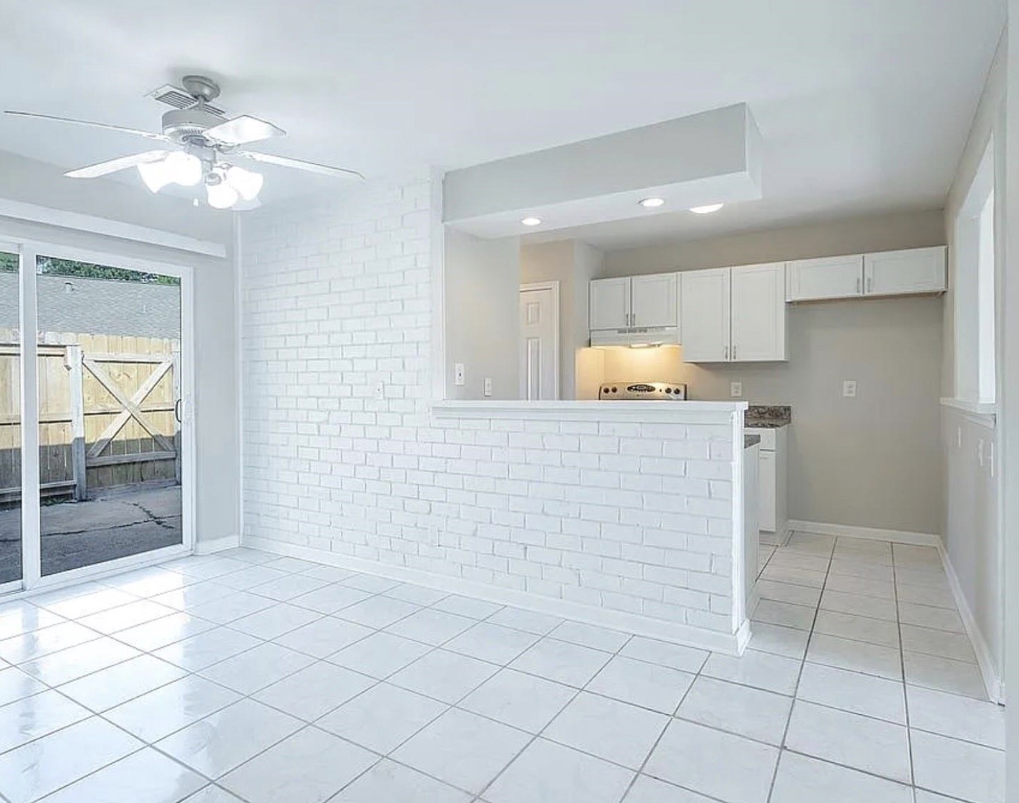 1965 Campbell Road, Unit 1965 Houston, TX 77080 - Photo 10 of 13 a view of an empty room and window
