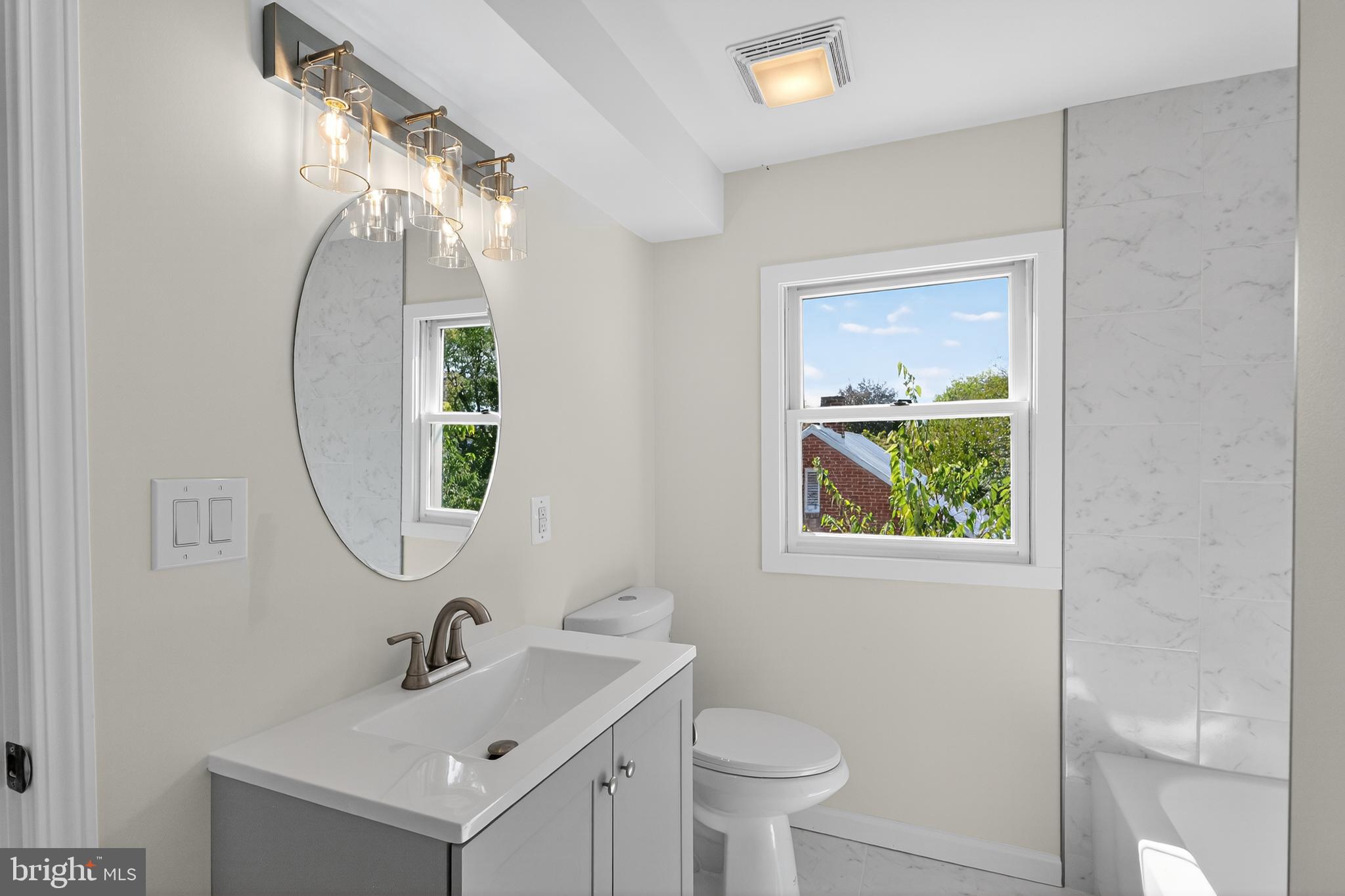 10612 Honeyfield Road Williamsport, MD 21795 - Photo 13 of 19 a bathroom with a sink and a mirror