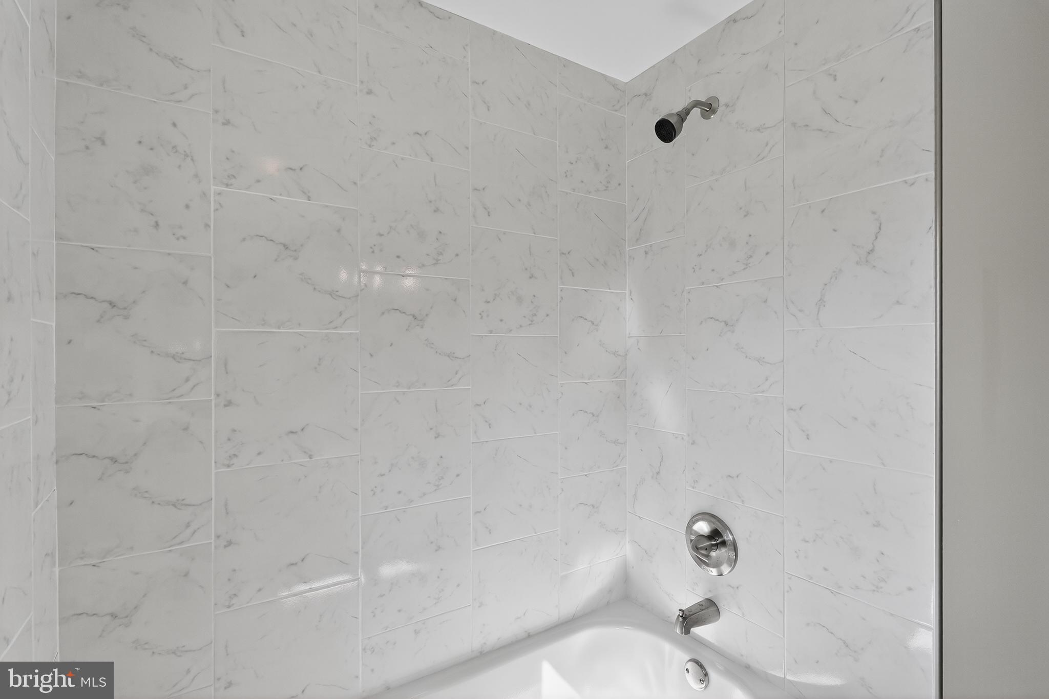 10612 Honeyfield Road Williamsport, MD 21795 - Photo 14 of 19 a bathroom with a shower and toilet