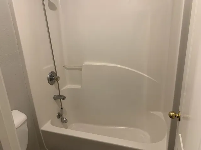 a close up of a bathtub