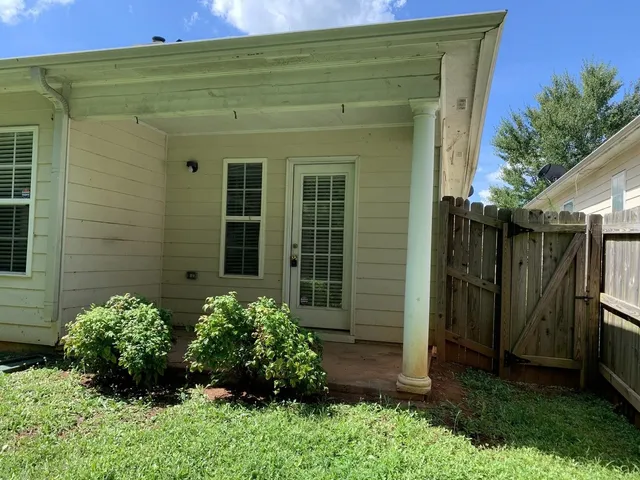 a backyard of a house with lots of green space